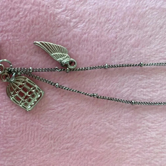 Silvertoned Necklace with multicharm(cage, bird and wing charms) pendant - Picture 8 of 9